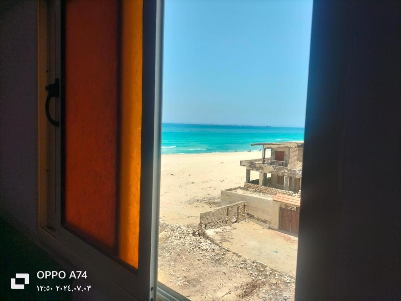 Flores Casas De Playa Alexandria Bagian luar foto